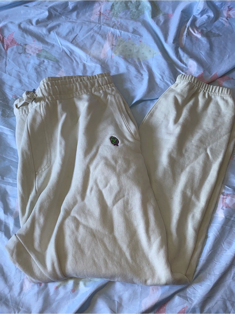 Cream women Sweatpants with Small Green Patch